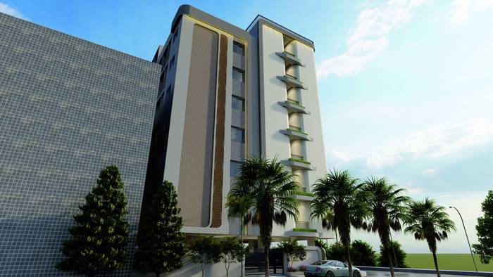 Chahat Residency side view with palms and landscaped entrance